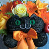 オレンジの花ネコ（黒猫）
